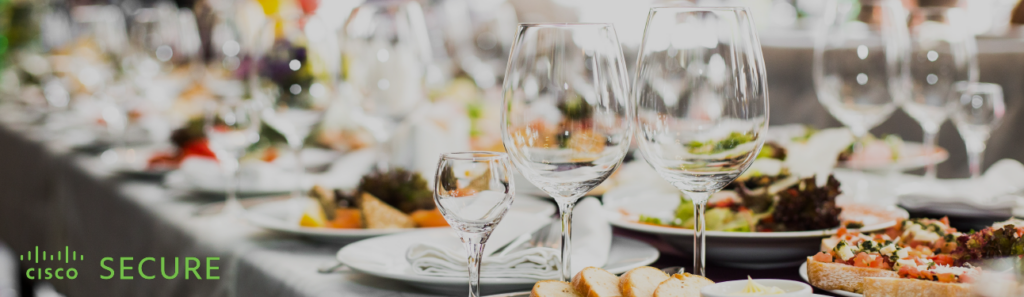 Image of wine glasses sitting on a dinner table
