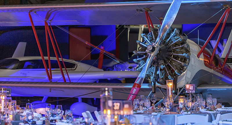 tables inside with a plane